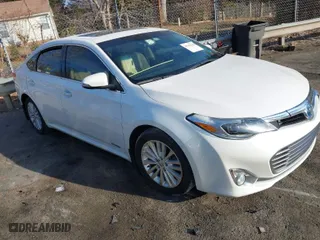 2014 Toyota Avalon Hybrid Limited with VIN 4T1BD1EB7EU035160, listed as a IAAI auction lot 41341738 with 88,519 mi miles. Bid and sale history available at carsss.com. Image 1.