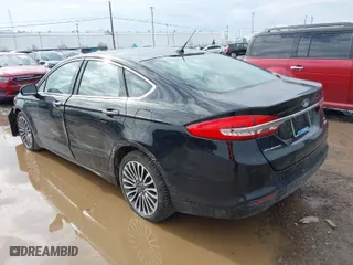 2018 Ford Fusion SE with VIN 3FA6P0HD6JR179665, listed as a IAAI auction lot 41719833 with 73,412 mi miles. Bid and sale history available at carsss.com. Image 3.