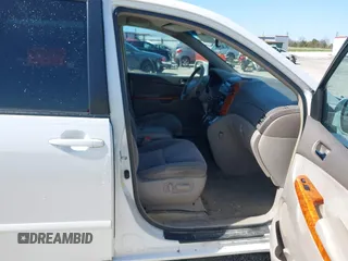 2006 Toyota Sienna XLE with VIN 5TDZA22C06S576958, listed as a IAAI auction lot 41978892 with 257,598 mi miles. Bid and sale history available at carsss.com. Image 5.