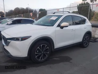 2022 Mazda CX-5 S Premium Plus with VIN JM3KFBEM6N0615083, listed as a IAAI auction lot 41907406 with 49,617 mi miles and . Bid and sale history available at carsss.com. Image 15.