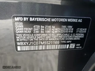 2021 BMW X2 xDrive28i with VIN WBXYJ1C07M5S21169, listed as a Copart auction lot 77829574 with 24,173 mi miles and Salvage Title. Bid and sale history available at carsss.com. Image 14.