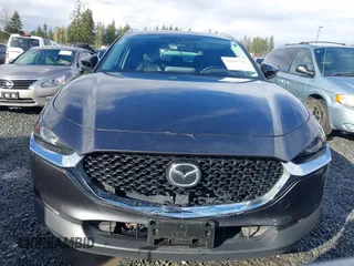 2021 Mazda CX-30 Premium with VIN 3MVDMBDY2MM239231, listed as a IAAI auction lot 41655159 with 22,679 mi miles and . Bid and sale history available at carsss.com. Image 13.
