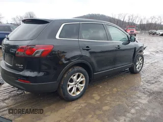2013 Mazda CX-9 Sport with VIN JM3TB3BA1D0414626, listed as a IAAI auction lot 41512593 with 118,731 mi miles and . Bid and sale history available at carsss.com. Image 4.