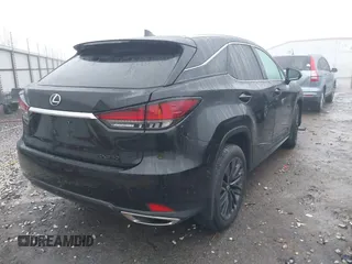 2022 Lexus RX with VIN 2T2HZMDA8NC314667, listed as a IAAI auction lot 41186876 with 30,493 mi miles. Bid and sale history available at carsss.com. Image 4.