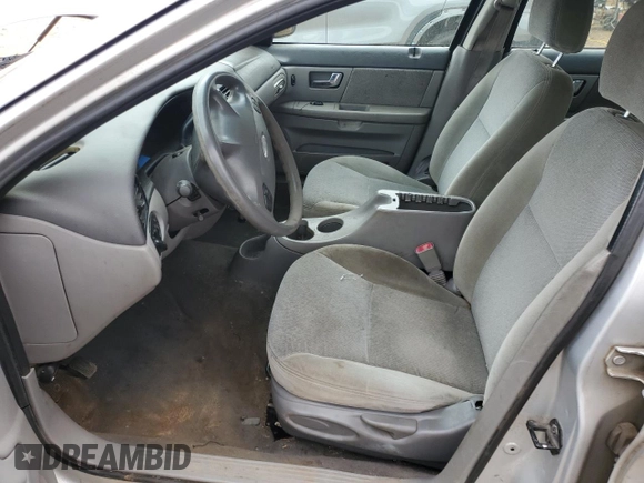 2000 Ford Taurus SE with VIN 1FAFP532XYA141783, listed as a Copart auction lot 43949795 with 203,939 mi miles and Salvage Title. Bid and sale history available at DreamBid. Image 7.