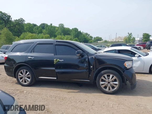 2013 Dodge Durango Crew z VIN 1C4RDJDG3DC685995, wystawiony jako IAAI lot #42490067 z przebiegiem 205 806 mil mil oraz . Historia ofert i sprzedaży dostępna na DreamBid. Obrazek 13.