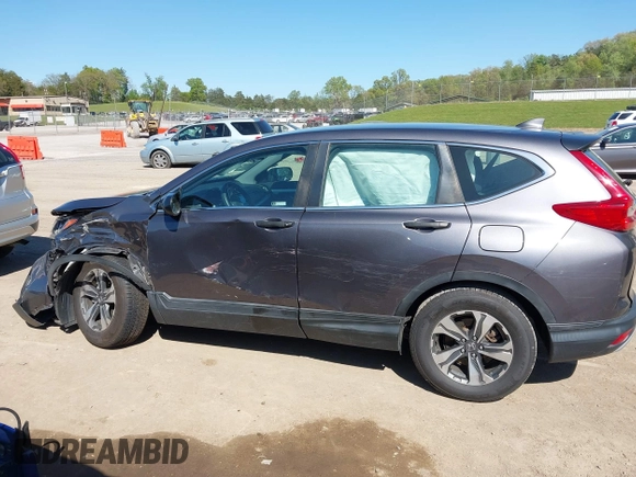 2019 Honda CR-V LX with VIN 2HKRW5H32KH410676, listed as a IAAI auction lot 42038654 with 94,342 mi miles. Bid and sale history available at carsss.com. Image 14.