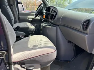 1998 Ford Econoline Passenger XL with VIN 1FMRE11L6WHB65841, listed as a IAAI auction lot 42123953 with 63,138 mi miles. Bid and sale history available at carsss.com. Image 5.