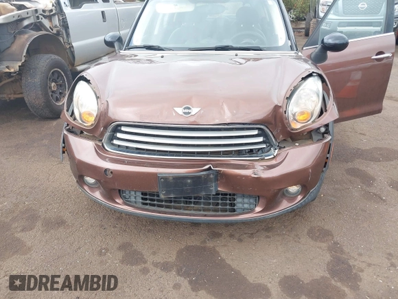2014 MINI Countryman with VIN WMWZB3C51EWR36737, listed as a IAAI auction lot 41741248 with 69,717 mi miles and . Bid and sale history available at DreamBid. Image 6.