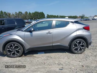2020 Toyota C-HR LE z VIN NMTKHMBX6LR106469, wystawiony jako IAAI lot #41972012 z przebiegiem 51 316 mil mil oraz . Historia ofert i sprzedaży dostępna na DreamBid. Obrazek 14.
