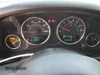 2014 Jeep Wrangler Unlimited Rubicon with VIN 1C4HJWFG1EL241014, listed as a Copart auction lot 63948655 with 165,650 mi miles and Salvage title. Bid and sale history available at DreamBid. Image 9.
