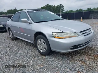 2002 Honda Accord EX z VIN 1HGCG16562A084499, wystawiony jako IAAI lot #42446830 z przebiegiem 241 615 mil mil oraz . Historia ofert i sprzedaży dostępna na DreamBid. Obrazek 1.