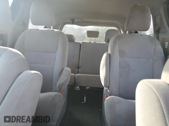 2019 Toyota Sienna L with VIN 5TDZZ3DC3KS015479, listed as a Copart auction lot 79917304 with 81,487 mi miles and Salvage Title. Bid and sale history available at carsss.com. Image 10.