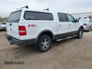 2005 Ford F-150 XLT with VIN 1FTPW14595FA87670, listed as a IAAI auction lot 42157009 with 291,713 mi miles. Bid and sale history available at carsss.com. Image 4.