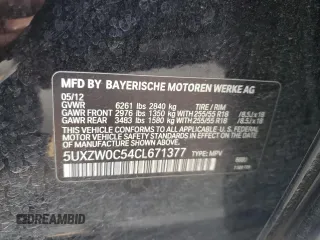 2012 BMW X5 35d with VIN 5UXZW0C54CL671377, listed as a Copart auction lot 60936395 with 105,903 mi miles and Salvage title. Bid and sale history available at DreamBid. Image 13.
