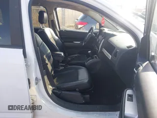 2014 Jeep Compass Latitude with VIN 1C4NJDEB8ED622012, listed as a IAAI auction lot 41917126 with 143,065 mi miles. Bid and sale history available at carsss.com. Image 5.