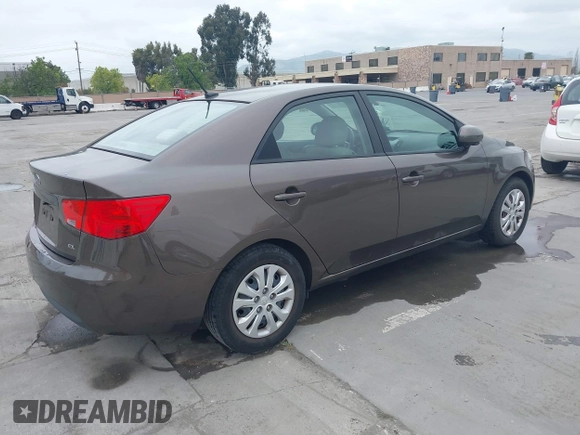 2013 Kia Forte EX with VIN KNAFU4A22D5711825, listed as a IAAI auction lot 42128778 with 112,889 mi miles. Bid and sale history available at carsss.com. Image 4.