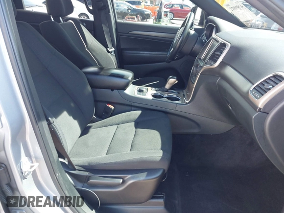 2016 Jeep Grand Cherokee Laredo z VIN 1C4RJFAG7GC392261, wystawiony jako IAAI lot #41890922 z przebiegiem 107 546 mil mil oraz . Historia ofert i sprzedaży dostępna na DreamBid. Obrazek 5.