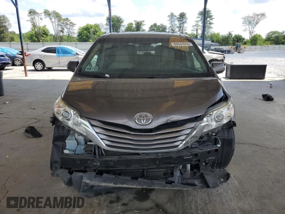 2015 Toyota Sienna XLE с VIN 5TDYK3DC0FS630013, выставлен на аукционе Copart как лот 60044955 с пробегом 124 063 миль миль и Списание • Salvage title. История ставок и продаж доступна на DreamBid. Изображение 5.