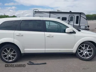 2015 Dodge Journey R/T z VIN 3C4PDDEG2FT680625, wystawiony jako IAAI lot #42177431 z przebiegiem 202 971 mil mil oraz . Historia ofert i sprzedaży dostępna na DreamBid. Obrazek 14.