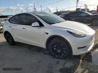 2020 Tesla Model Y Long Range with VIN 5YJYGDEE5LF040347, listed as a Copart auction lot 45598615 with 72,179 mi miles and Salvage Title. Bid and sale history available at carsss.com. Image 4.