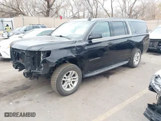 2019 Chevrolet Suburban LT with VIN 1GNSKHKC0KR159583, listed as a IAAI auction lot 41309350 with 196,844 mi miles. Bid and sale history available at carsss.com. Image 2.