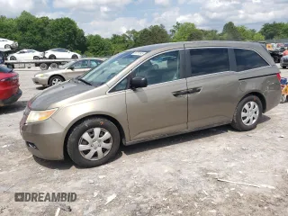 2012 Honda Odyssey LX z VIN 5FNRL5H29CB081071, wystawiony jako Copart lot #56751545 z przebiegiem 233 240 mil mil oraz Szkoda całkowita • Salvage title. Historia ofert i sprzedaży dostępna na DreamBid. Obrazek 1.