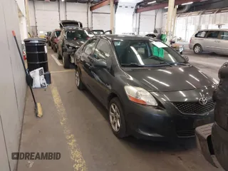 2010 Toyota Yaris with VIN JTDBT4K33A1354492, listed as a IAAI auction lot 40736581 with 228,018 mi miles. Bid and sale history available at carsss.com. Image 1.