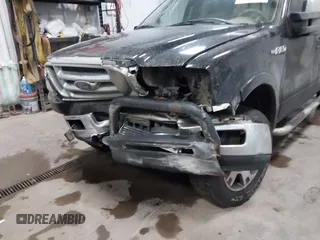 2004 Ford F-150 XLT with VIN 1FTPW14584KB43877, listed as a IAAI auction lot 41092424 with 237,990 mi miles. Bid and sale history available at carsss.com. Image 6.