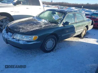 1998 Lincoln Continental with VIN 1LNFM97V4WY713283, listed as a IAAI auction lot 41264918 with 89,134 mi miles. Bid and sale history available at carsss.com. Image 17.
