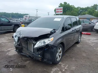 2014 Toyota Sienna L with VIN 5TDZK3DC5ES439593, listed as a IAAI auction lot 42420219 with 136,544 mi miles and . Bid and sale history available at DreamBid. Image 6.