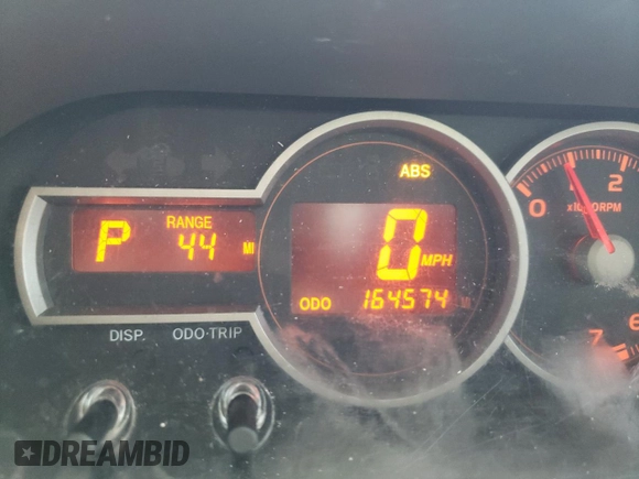 2014 Scion xB z VIN JTLZE4FE9EJ064207, wystawiony jako Copart lot #58377305 z przebiegiem 164 574 mil mil oraz Czysty tytuł • Clean title. Historia ofert i sprzedaży dostępna na DreamBid. Obrazek 9.