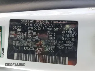 2022 Kia EV6 Wind z VIN KNDC34LA2N5056550, wystawiony jako Copart lot #49640585 z przebiegiem 72 670 mil mil oraz Szkoda całkowita • Salvage title. Historia ofert i sprzedaży dostępna na DreamBid. Obrazek 13.