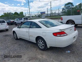 1999 Toyota Solara SE with VIN 2T1CF22PXXC233661, listed as a IAAI auction lot 42196878 with 157,682 mi miles. Bid and sale history available at carsss.com. Image 3.