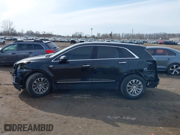 2019 Cadillac XT5 Luxury AWD with VIN 1GYKNDRS5KZ172975, listed as a IAAI auction lot 41814397 with 63,563 mi miles and . Bid and sale history available at carsss.com. Image 14.