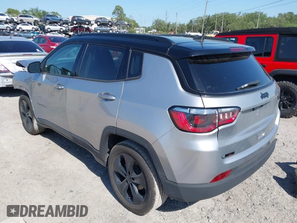 2021 Jeep Compass Altitude with VIN 3C4NJCBB5MT509187, listed as a IAAI auction lot 42021788 with 51,841 mi miles. Bid and sale history available at carsss.com. Image 3.