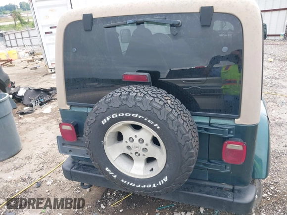 1999 Jeep Wrangler Sahara with VIN 1J4FY49S5XP482037, listed as a IAAI auction lot 42341723 with 161,081 mi miles and . Bid and sale history available at DreamBid. Image 17.