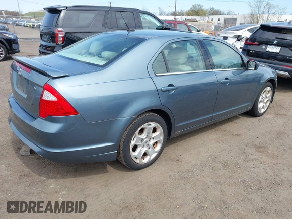 2011 Ford Fusion SE with VIN 3FAHP0HA0BR254554, listed as a IAAI auction lot 42067438 with 104,691 mi miles. Bid and sale history available at carsss.com. Image 4.