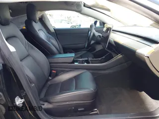 2019 Tesla Model 3 Mid Range with VIN 5YJ3E1EA1KF410297, listed as a IAAI auction lot 41841991 with 176,254 mi miles. Bid and sale history available at carsss.com. Image 5.