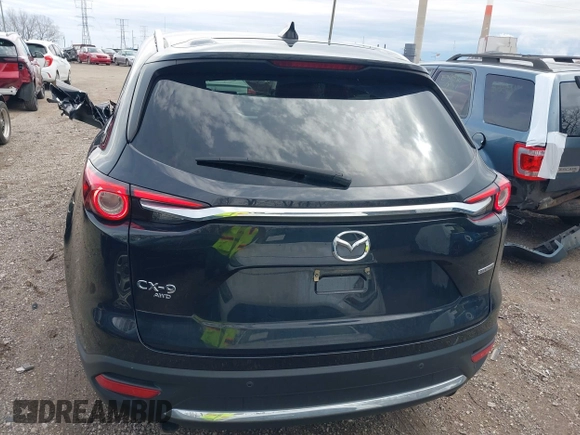 2020 Mazda CX-9 Grand Touring with VIN JM3TCBDY3L0419049, listed as a IAAI auction lot 41948393 with 70,163 mi miles and . Bid and sale history available at DreamBid. Image 16.