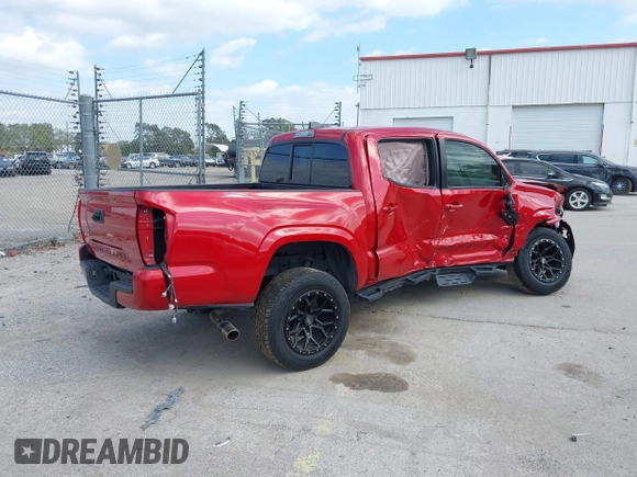 2022 Toyota Tacoma SR with VIN 3TYAX5GN1NT039848, listed as a IAAI auction lot 41210811 with 93,670 mi miles and . Bid and sale history available at DreamBid. Image 4.