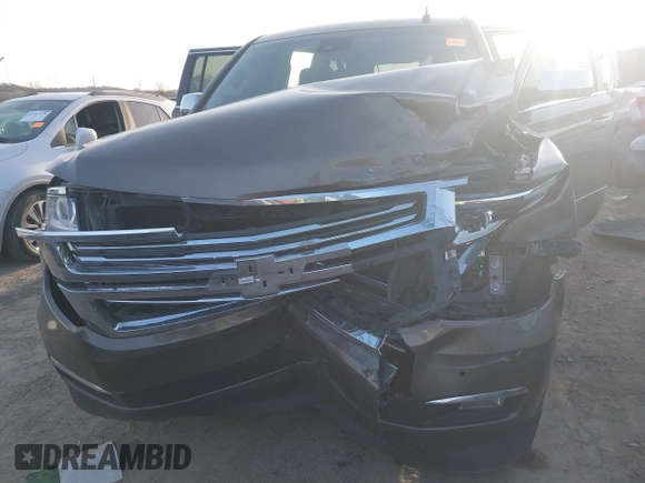 2015 Chevrolet Suburban LTZ with VIN 1GNSKKKC1FR628182, listed as a IAAI auction lot 41801391 with Not Provided miles and . Bid and sale history available at DreamBid. Image 12.
