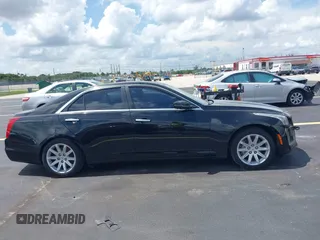 2014 Cadillac CTS RWD with VIN 1G6AP5SX0E0185913, listed as a IAAI auction lot 42685622 with 107,406 mi miles and . Bid and sale history available at DreamBid. Image 13.