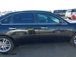 2013 Chevrolet Impala LTZ with VIN 2G1WC5E3XD1208357, listed as a IAAI auction lot 42053811 with 376,518 mi miles. Bid and sale history available at carsss.com. Image 13.