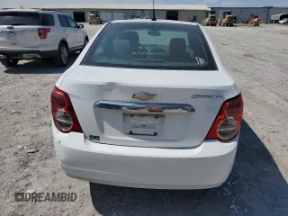 2013 Chevrolet Sonic LT with VIN 1G1JC5SH4D4164838, listed as a Copart auction lot 53611635 with 134,098 mi miles and Salvage Title. Bid and sale history available at DreamBid. Image 6.