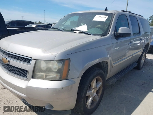 2007 Chevrolet Suburban LS with VIN 1GNFC16087J239886, listed as a IAAI auction lot 41874548 with 303,014 mi miles and . Bid and sale history available at DreamBid. Image 2.