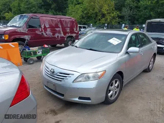 2007 Toyota Camry CE with VIN 4T1BE46K77U140703, listed as a IAAI auction lot 40193348 with 183,987 mi miles. Bid and sale history available at carsss.com. Image 17.