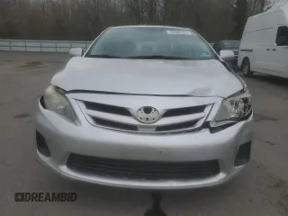 2012 Toyota Corolla L with VIN 2T1BU4EE0CC800140, listed as a Copart auction lot 52686455 with 203,407 mi miles and Salvage Title. Bid and sale history available at carsss.com. Image 5.