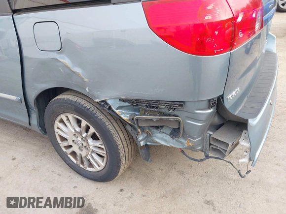 2008 Toyota Sienna XLE with VIN 5TDZK22C18S102498, listed as a IAAI auction lot 41623508 with 214,485 mi miles. Bid and sale history available at carsss.com. Image 6.