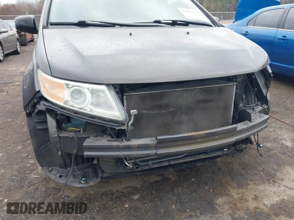 2012 Honda Odyssey Touring with VIN 5FNRL5H99CB071010, listed as a IAAI auction lot 41651233 with 186,913 mi miles. Bid and sale history available at carsss.com. Image 6.